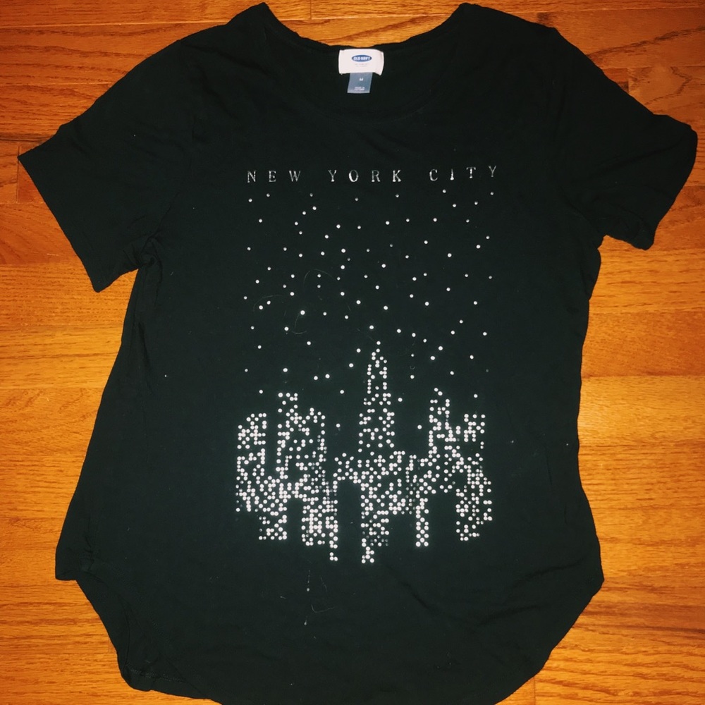 a black shirt with new york city graphics